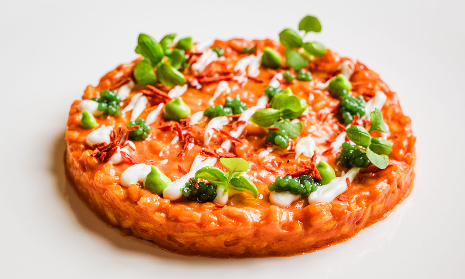 Risotto ai tre pomodori con fonduta di provola e crema al basilico - ricetta chef Marcello Romano - Salone Eva - Roma