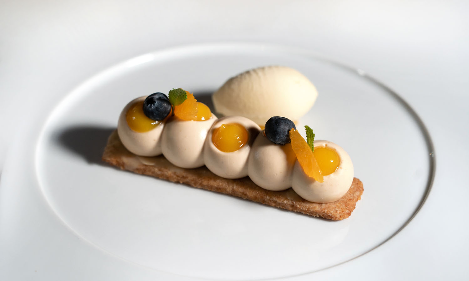 Ricetta stellata "Mousse ai Ricciarelli, gel al mandarino e il suo sorbetto" - chef Davide Canella - Contrada - Castelnuovo Berardenga
